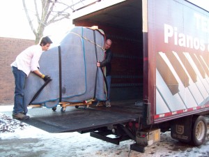 Grand Piano move off truck